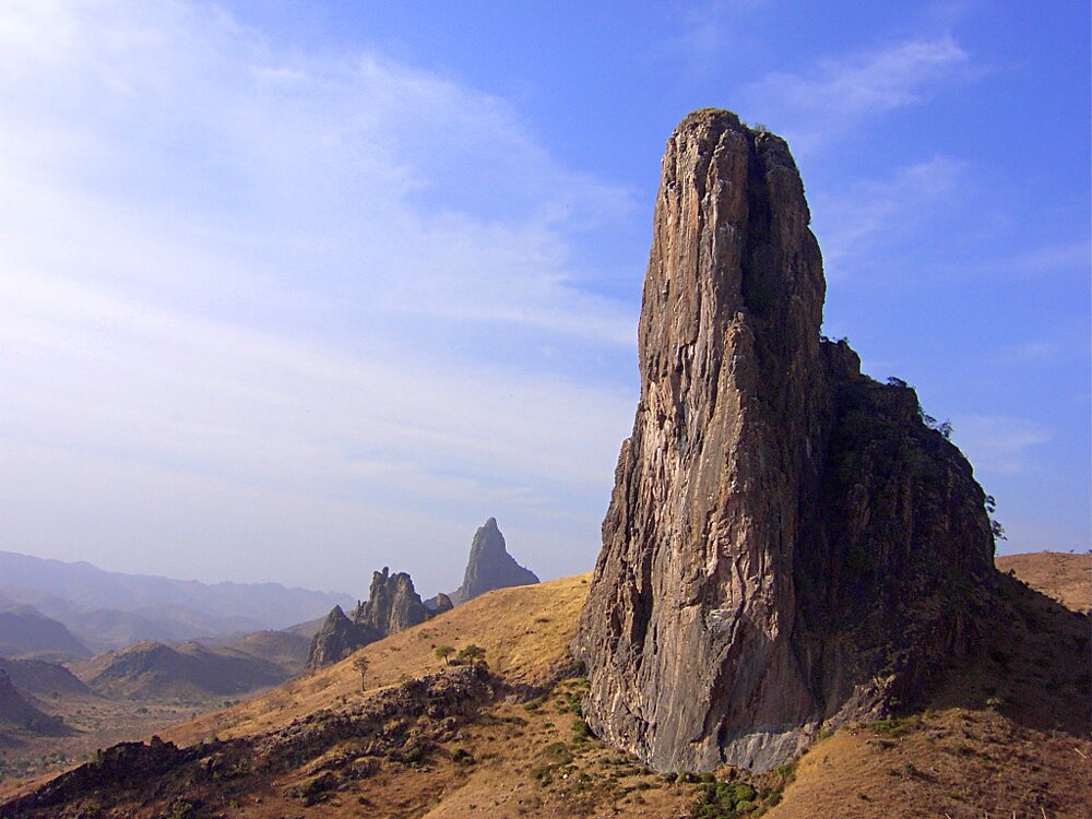 Rhumsiki Peak in Cameroon's far north, where local governments and development organizations are collaborating to implement energy solutions like solar-powered water towers. CC BY-SA 3.0
