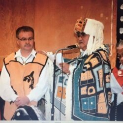 Donnie Wesley (tan vest with killer whale, centre of first picture) says these photos of the 2008 feast where he received his chief's name Yahaan prove his legitimate claim to chiefdom (Wesley Family photos, provided)