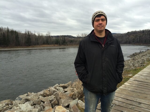 Jacob Beaton stands in front of the Skeena River in Hazelton, B.C.. Beaton says government can be clueless when it comes to consulting with First Nations on major energy projects