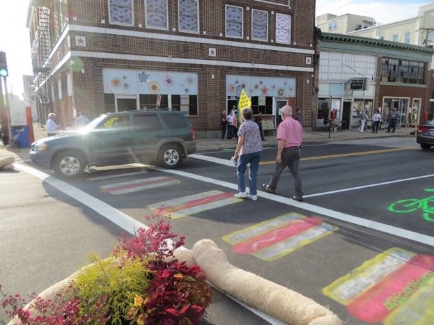 Temporary street art, landscaping, and bike lanes at a Build a Better Block even in Norfolk, VA. Source: Build a Better Block