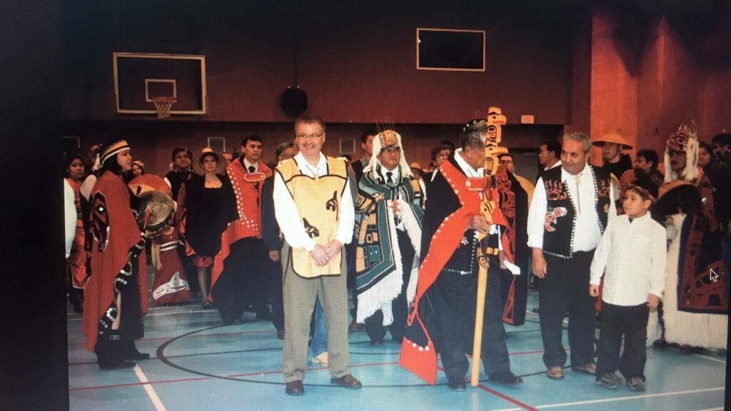 Donnie Wesley (tan vest with killer whale, centre of first picture) says these photos of the 2008 feast where he received his chief's name Yahaan prove his legitimate claim to chiefdom (Wesley Family photos, provided)